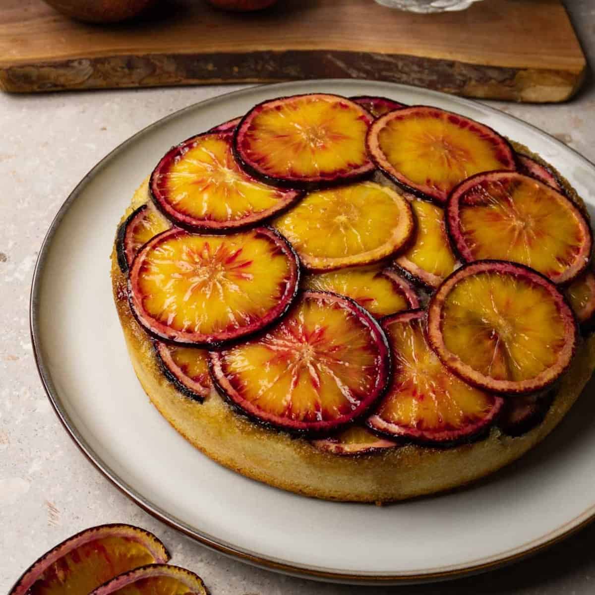 One layer cake with blood orange topping.